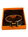 Hermes Black & Gold Polished Enamel Yellow Gold-Plated Twist Lock Bracelet Black & Gold