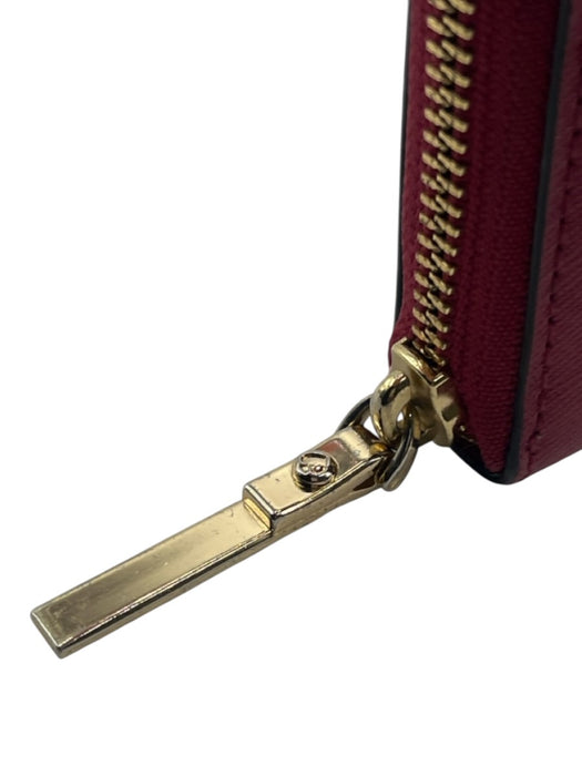 Kate Spade Raspberry Pink Saffiano Leather Zip Close Logo Back Pocket Wallets Raspberry Pink