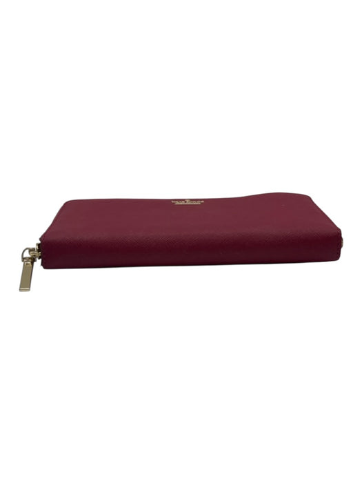 Kate Spade Raspberry Pink Saffiano Leather Zip Close Logo Back Pocket Wallets Raspberry Pink