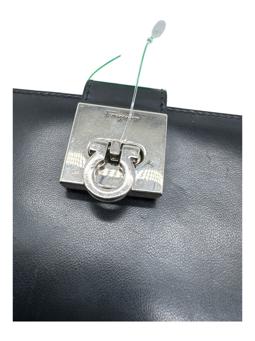 Salvatore Ferragamo Black Leather silver tone hardware Turn Lock Bifold Wallets Black
