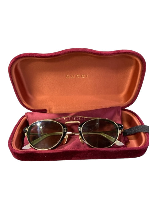 Gucci Black, Gold & Green Plastic & Metal round Engraved Tinted Sunglasses Black, Gold & Green