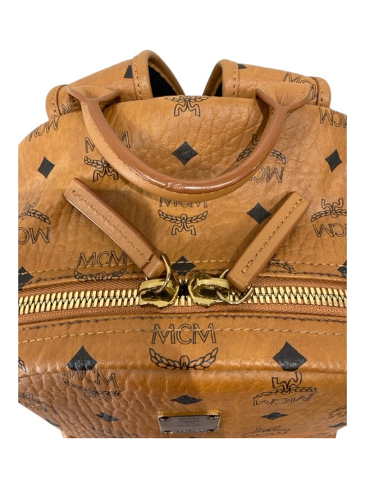 MCM Tan & black Leather Zip Close Monogram Gold Hardware Backpack Bag Tan & black / Large