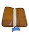 Tumi Orange Leather Zip Around Pebbled Wallets Orange