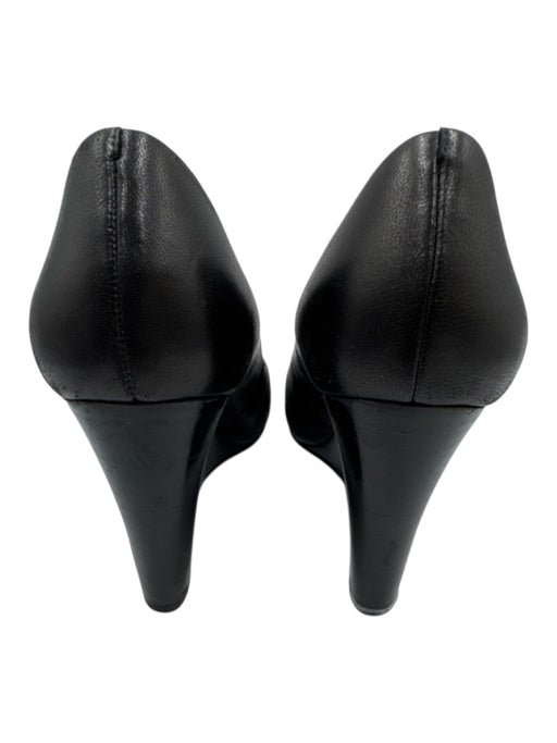 Tory Burch Shoe Size 6.5 Black Leather Upper Logo Plate Peep Toe Wedge Pumps Black / 6.5