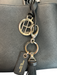 Henri Bendel Black Leather Gold hardware Zip Close Tassel Top Handle Bag Black