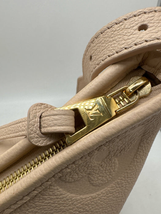 Louis Vuitton Beige Leather Embossed Monogram Empreinte Pouch Inc. Bag