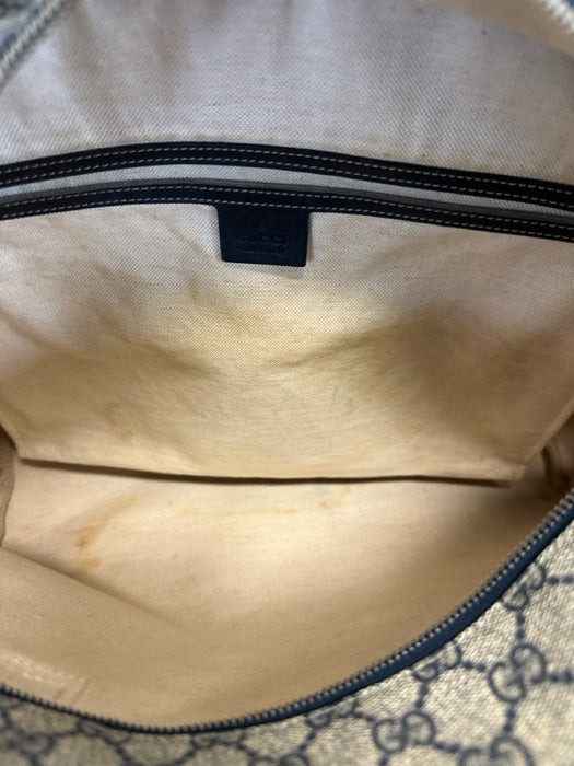 Labels Resale Boutique Gucci Guccissima shoulder bag interior showing beige canvas lining with visible staining