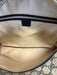 Labels Resale Boutique Gucci Guccissima shoulder bag interior showing beige canvas lining with visible staining